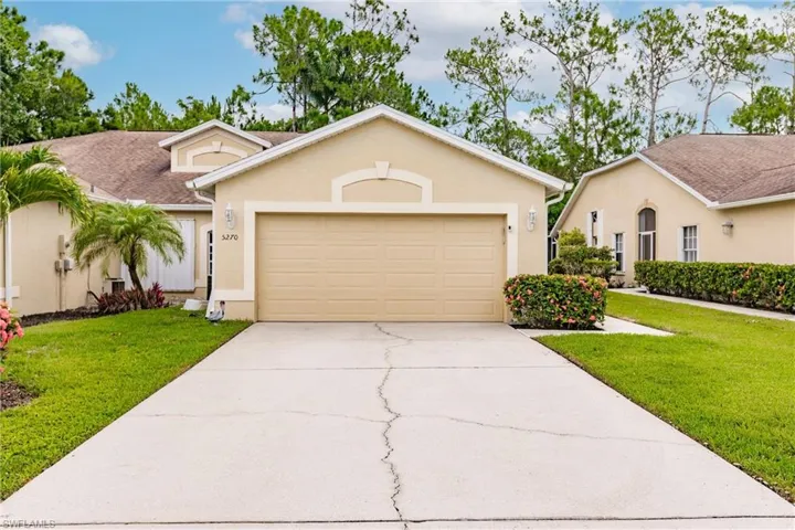 Single story home with two car attached garage