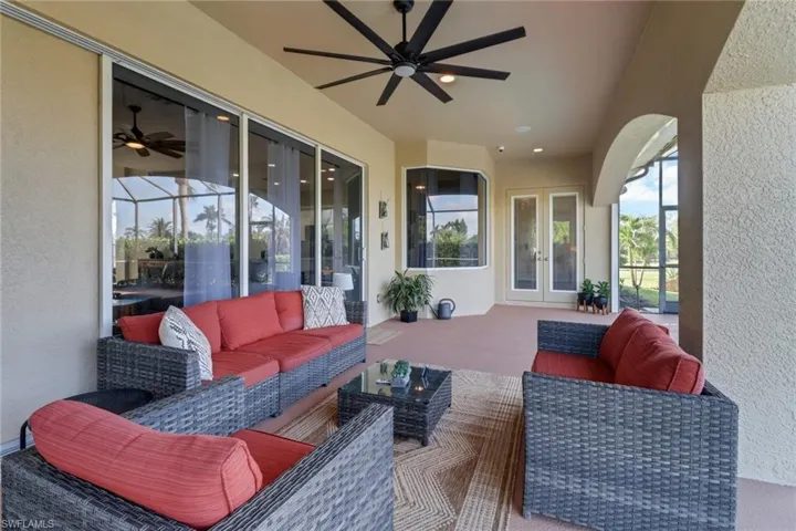 Pocket sliders so all 3 slider doors can be fully openl; French doors lead to primary bedroom
