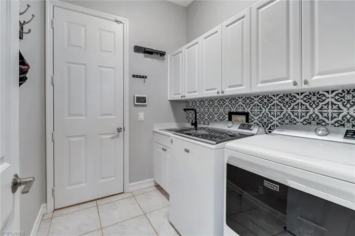 Door leads to 2.5 car garage