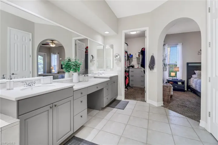dual sinks and large walk-in closet