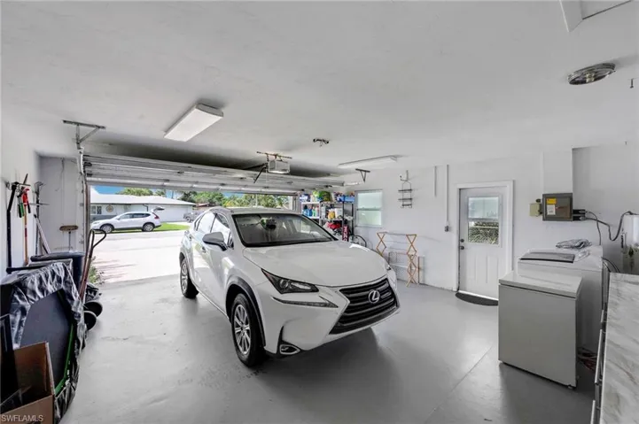 Oversized garage w/Laundry hook ups & storage