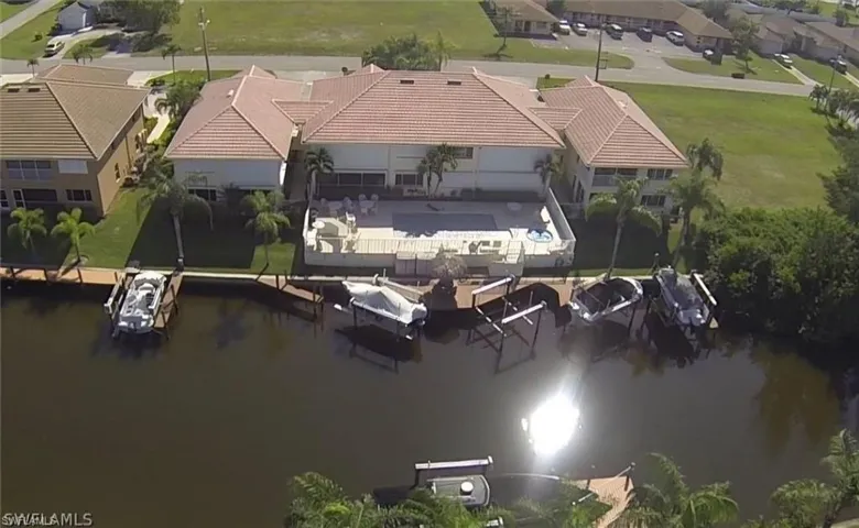 Aerial view of residential area with a large body of water