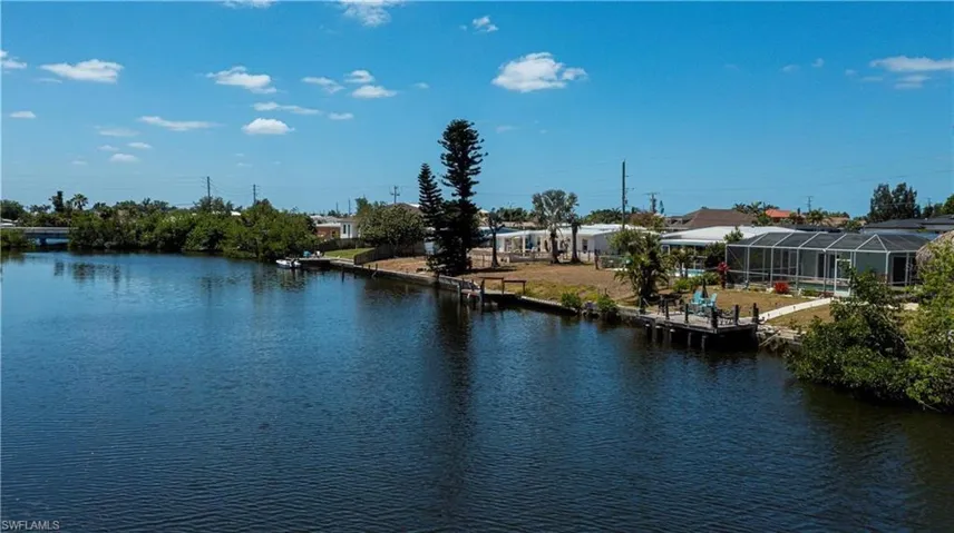 Water view with a dock