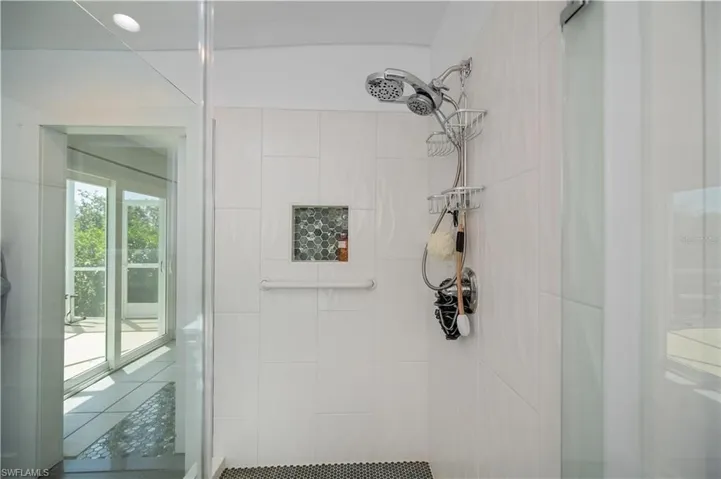 Full bath with a shower stall
