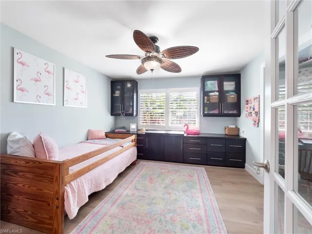 Bedroom featuring light wood-style flooring and ceiling fan
