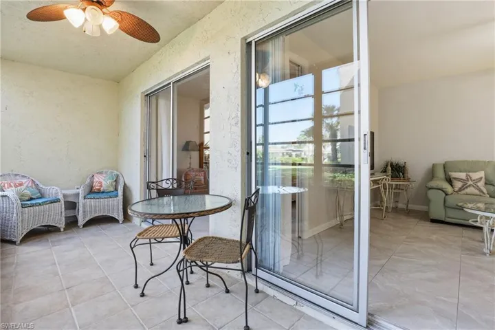 Balcony featuring ceiling fan