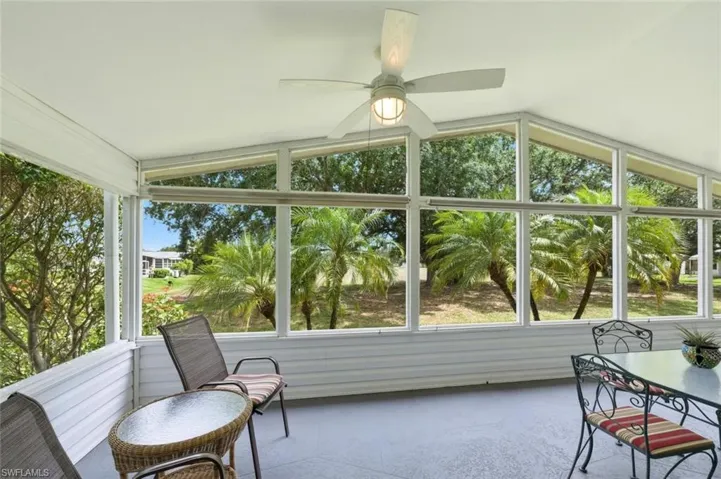 Large screened lanai with stamped concrete flooring