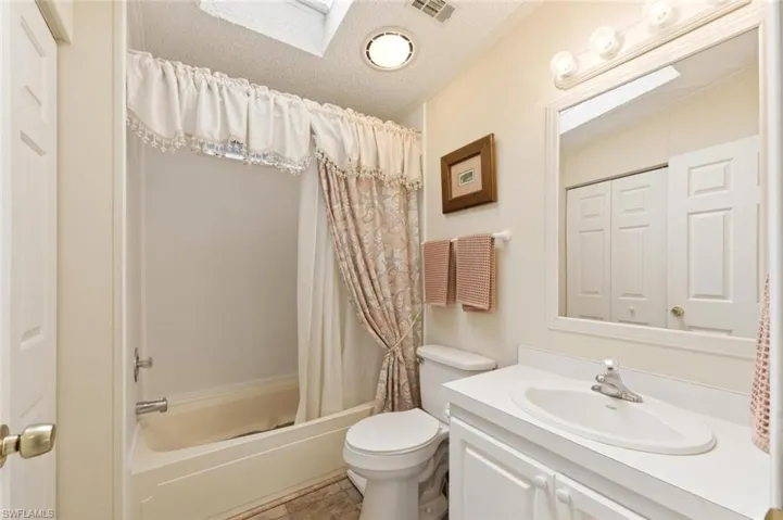 Guest Bath with closet enclosing the W/D