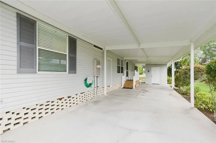 Room for up to 4 cars in the driveway, 2 under the carport