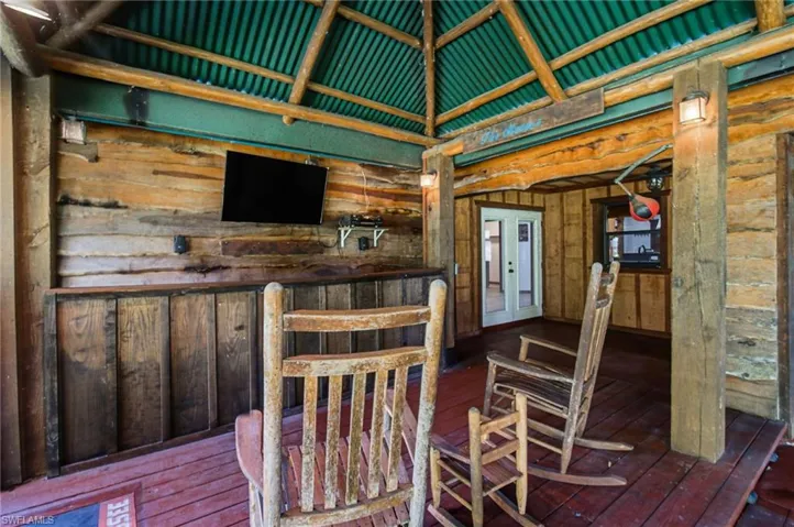 Covered outdoor space with built in bar area