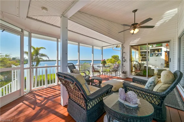 Screened in lanai for outdoor dining and sunset viewing.