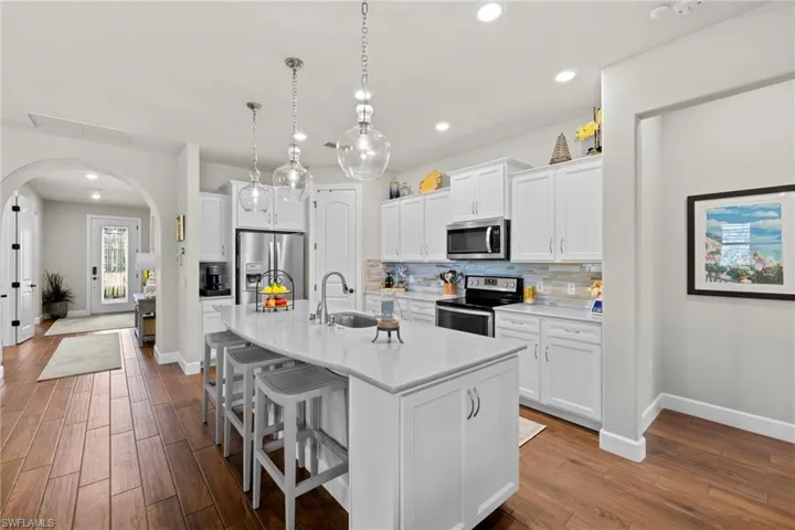 Open concept Kitchen leading to the livingroom