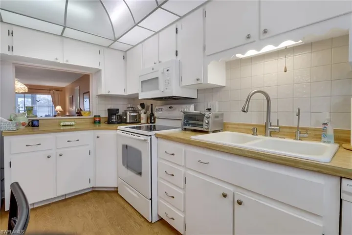 Spacious kitchen with ample countertop area for preparing delicious meals for family and friends