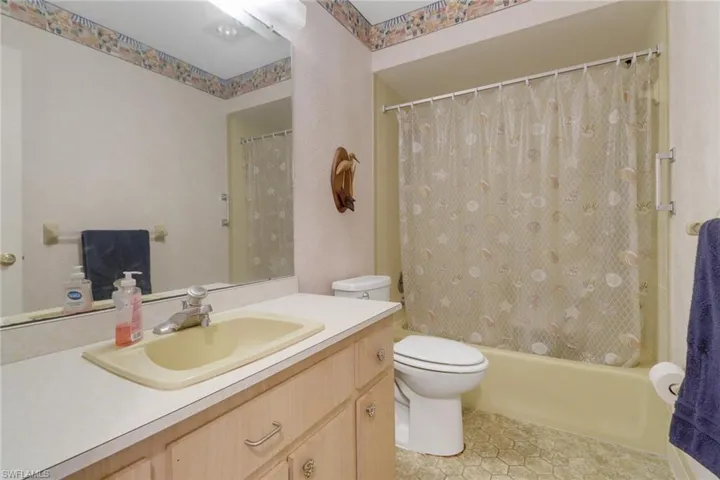 Full bathroom with shower / bathtub combination
