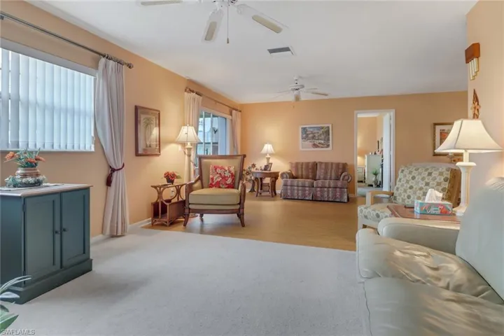 Light & bright living room welcomes family and friends to sit and enjoy quality time  together