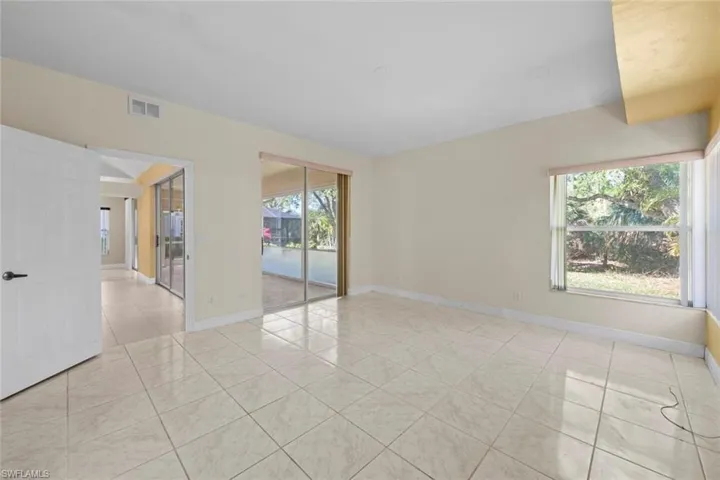 Master bedroom with slider access to lanai