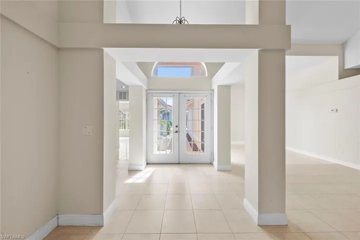 Double door entrance with columns