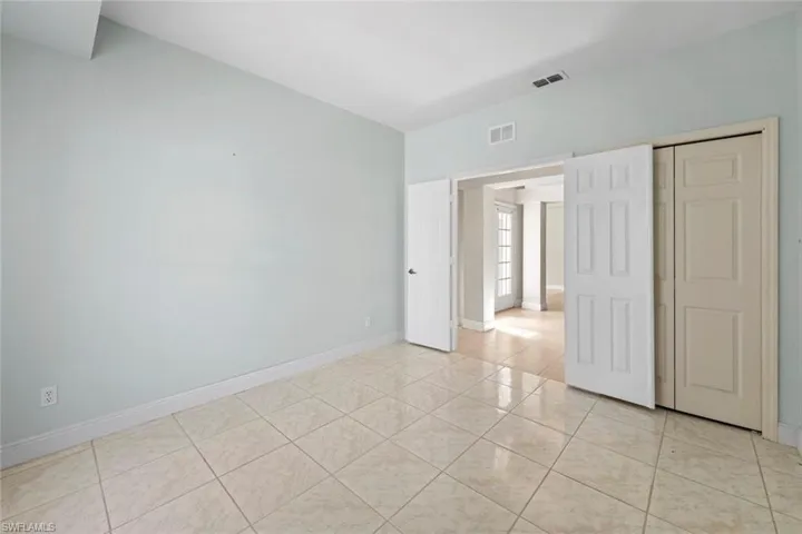 Second bedroom with french doors, to be used as bedroom or office