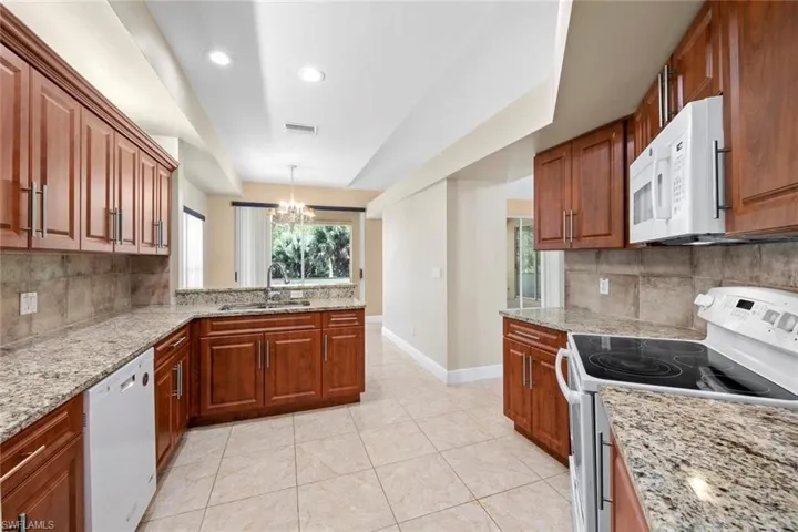 Kitchen has new granite and cabinets