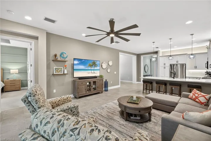 Note the custom millwork frames around the entry to the dining room and!