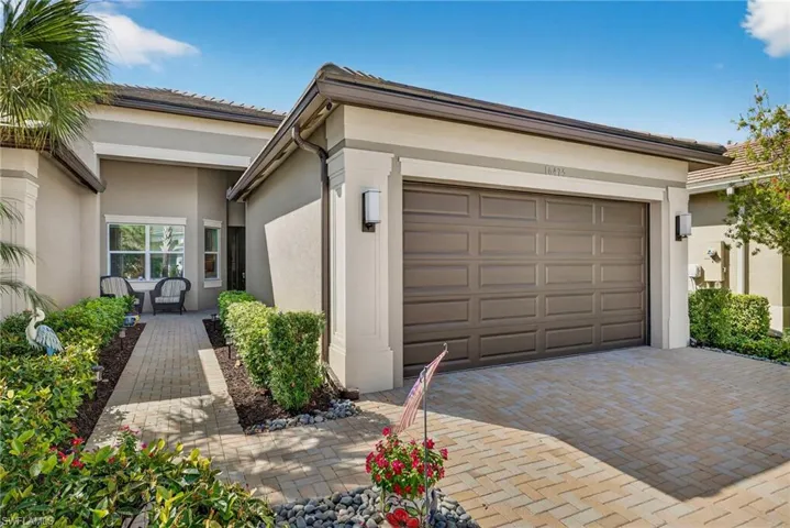 Note the extended pavers present here which makes for a wider driveway and cleaner look!