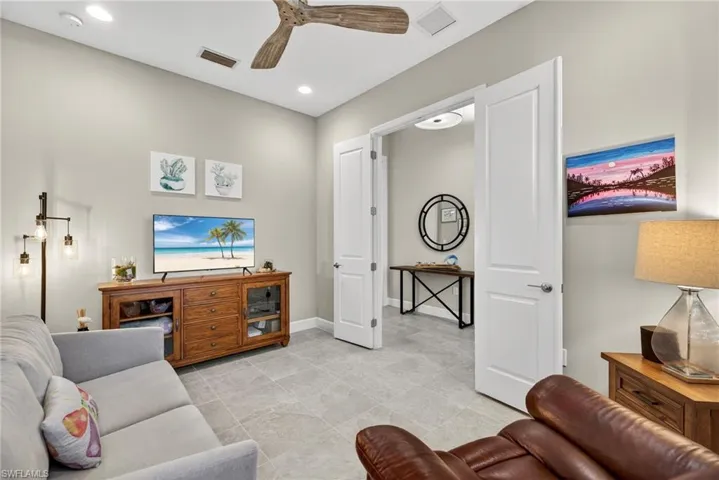 Located to the left of the foyer, spacious den!