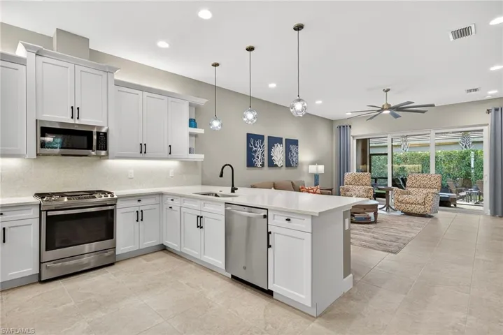 Never miss any action when cooking here! Kitchen opens up into great room!