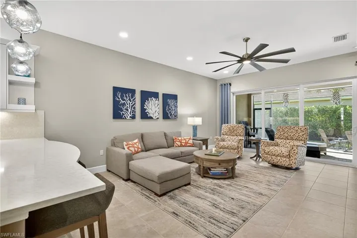 Beautiful glass pendant lighting, shelves to show off your treasures, and curved breakfast bar edges are just a few reasons this villa is special!