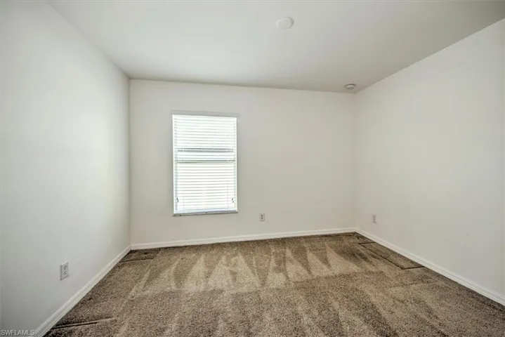 View of carpeted 2nd bedroom