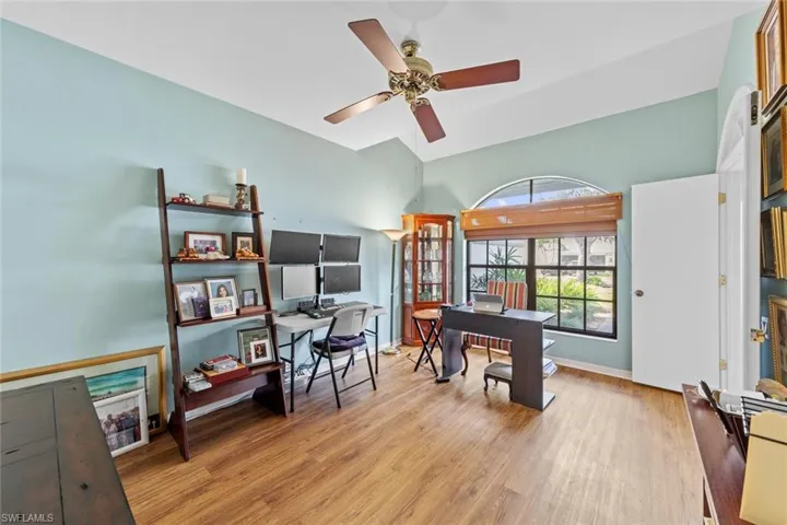 Office space featuring light wood-type flooring and ceiling fan