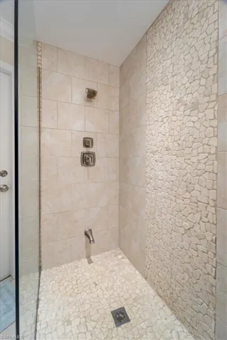 Bathroom with tiled shower