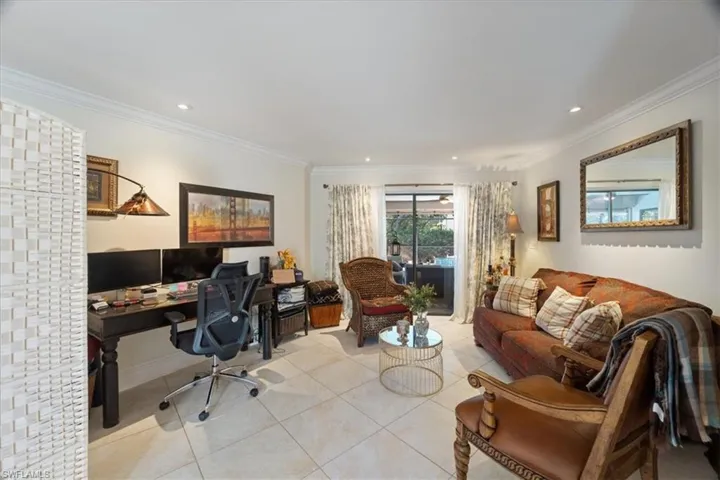 Office featuring light tile patterned floors, recessed lighting, and ornamental molding