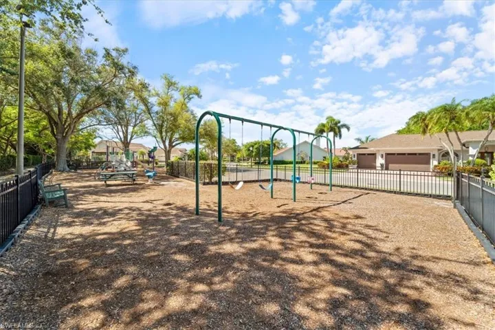 Community jungle gym with fence
