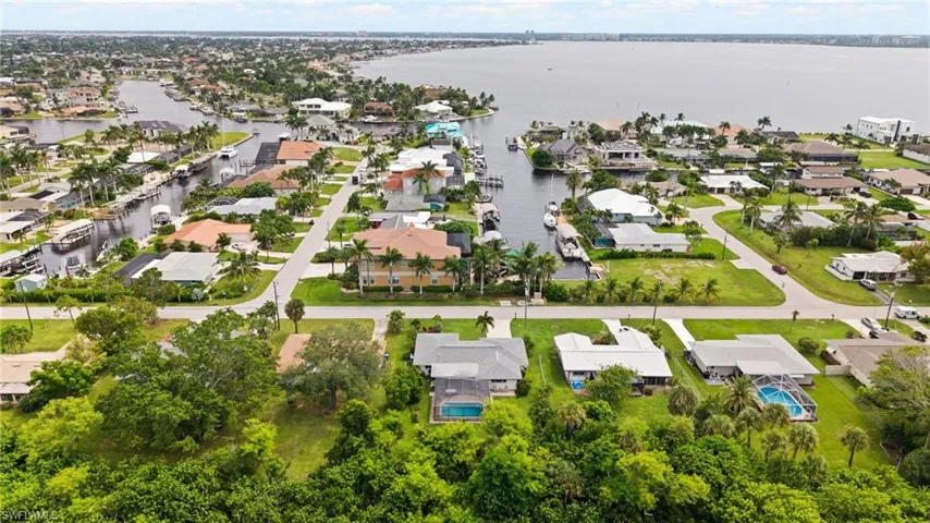 Aerial View with River in Front of Home