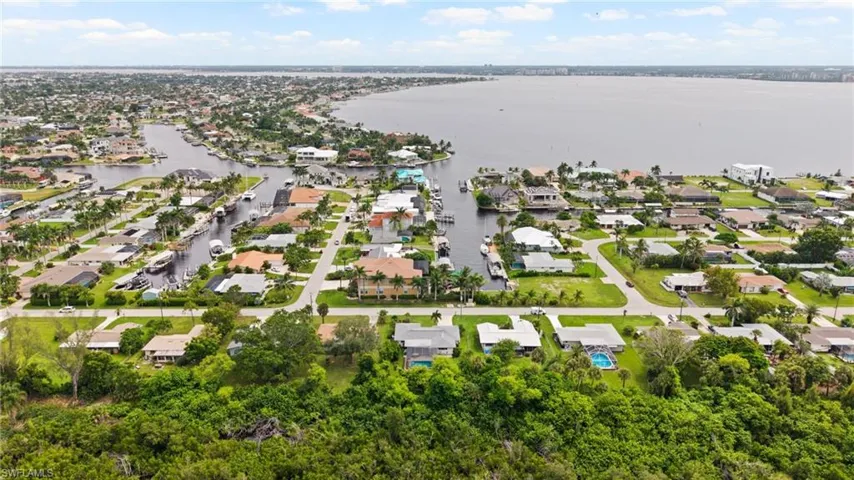 Aerial View with River in front of home