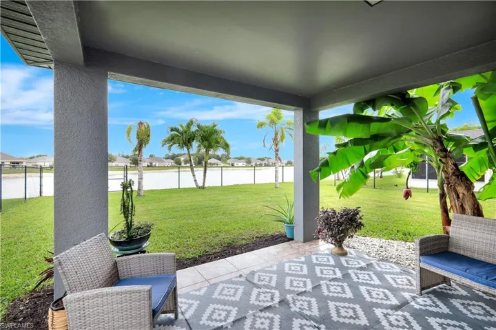 View of patio / terrace featuring a residential view and a water view