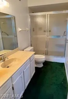 Master Bathroom with vanity and a stall shower