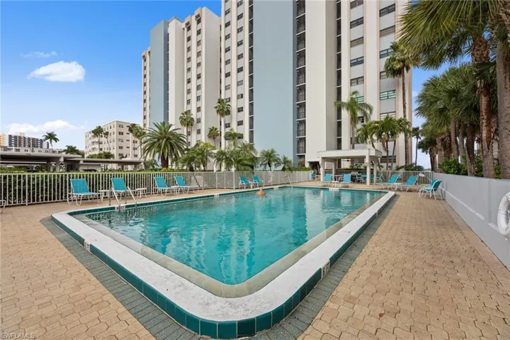 Community pool with a patio area