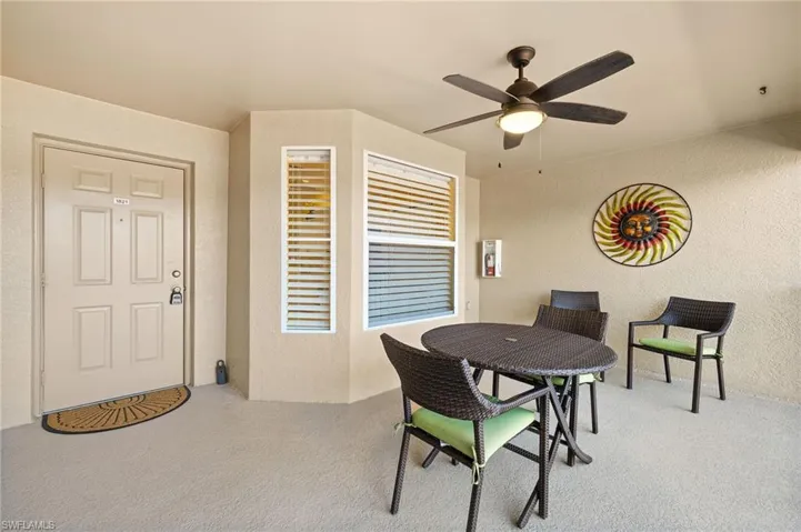 Condo features two lanais, front entry, veranda, and rear facing, lanai, with water & golf views.