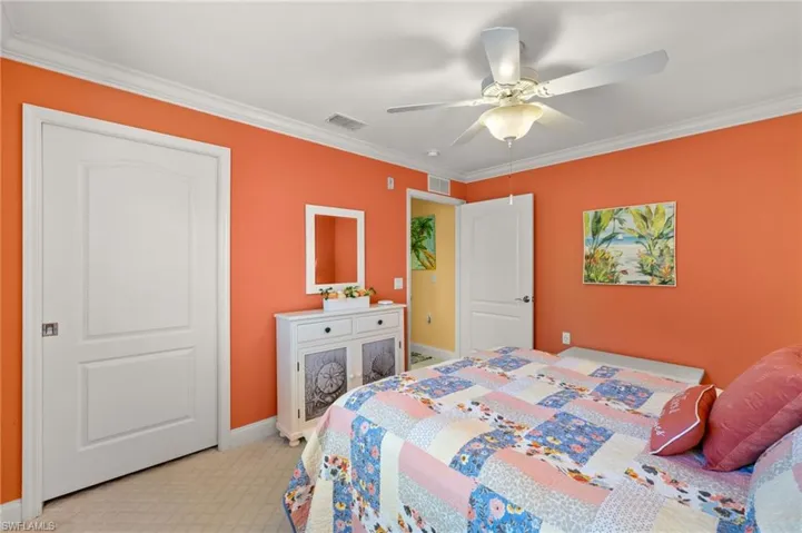 Guest room, pocket slider to walk-in closet.