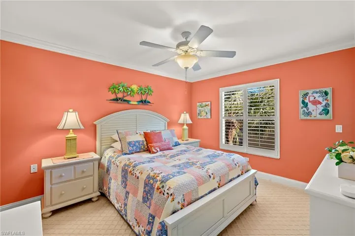 Inviting guest room, tree top views, plantation shutters, luxurious carpet.