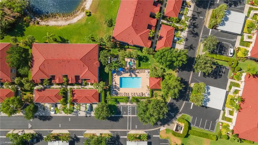 Drone / aerial view featuring one of three Cypress Trace neighborhood pools.