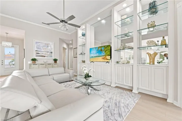 Living Room with access to Master Bedroom and outdoor Pool Deck