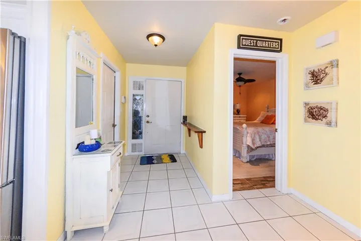 Bedroom featuring recessed lighting, a ceiling fan, and tiled flooring