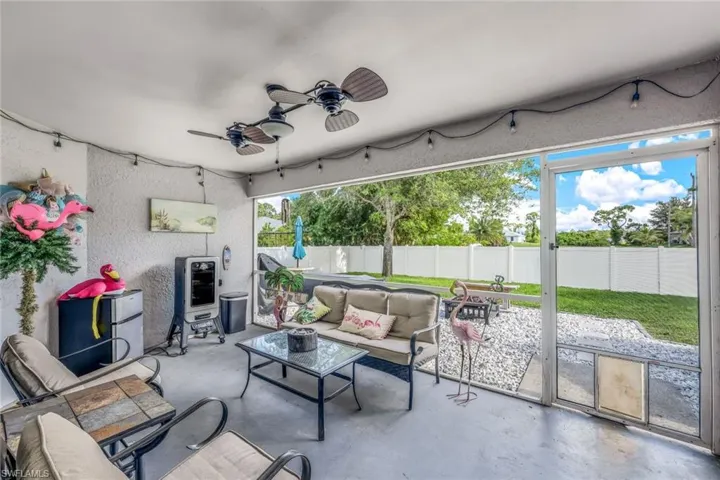 Screened Patio looking out to backyard.