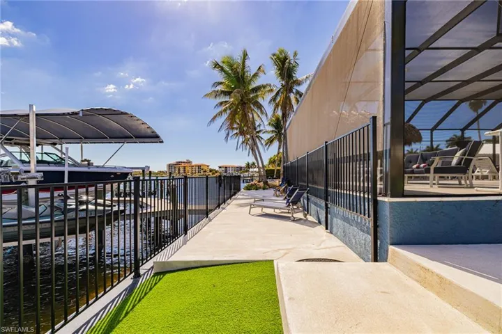 Surrounding community featuring a water view
