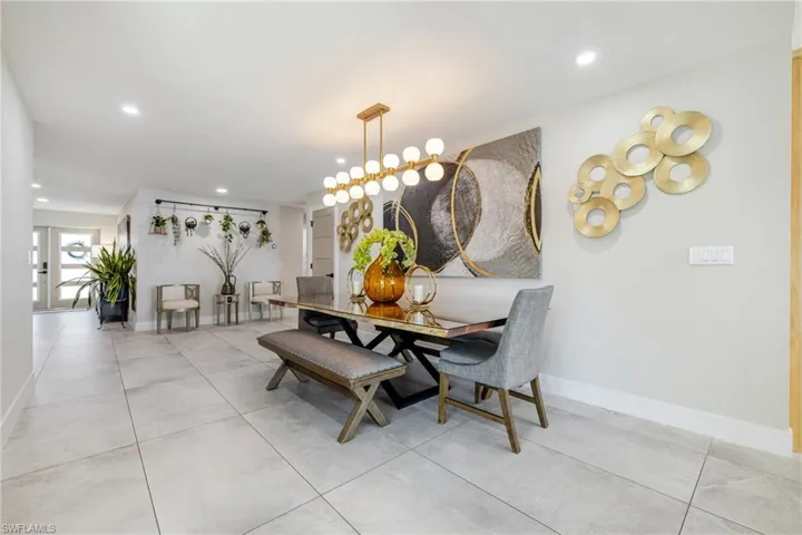 Dining space featuring baseboards and recessed lighting