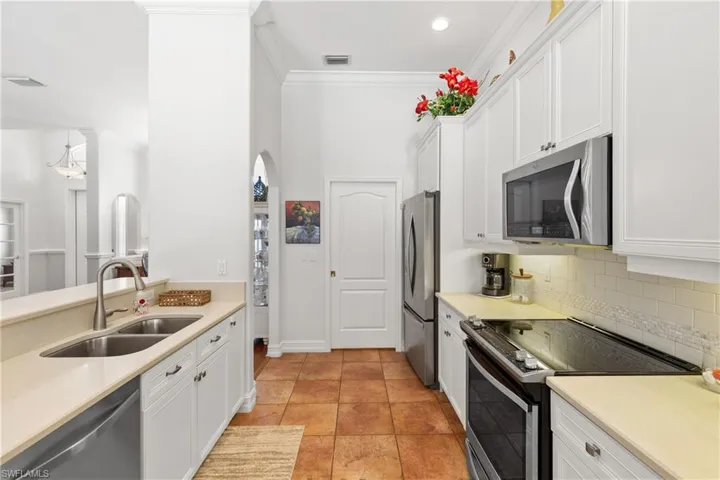 Stainless Steel Appliances/Pantry Through Door.