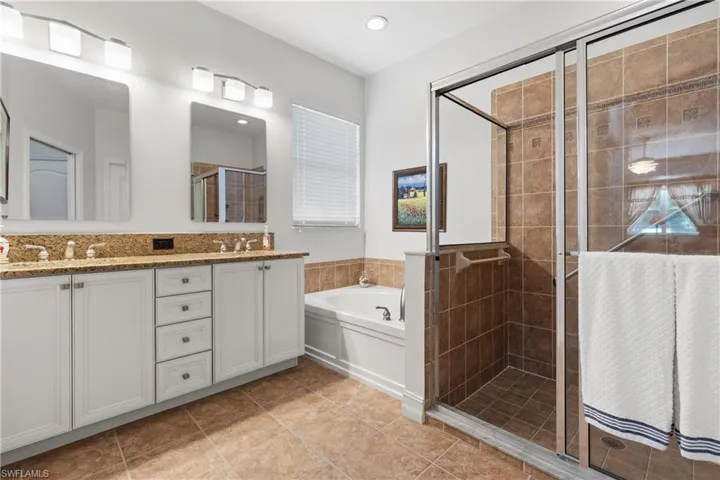Soaking Tub & Spacious Shower & Dual Sinks in Vanity.