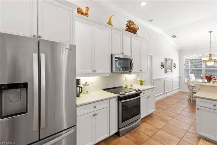 All the Conveniences of a Designer Kitchen + Large Pantry.